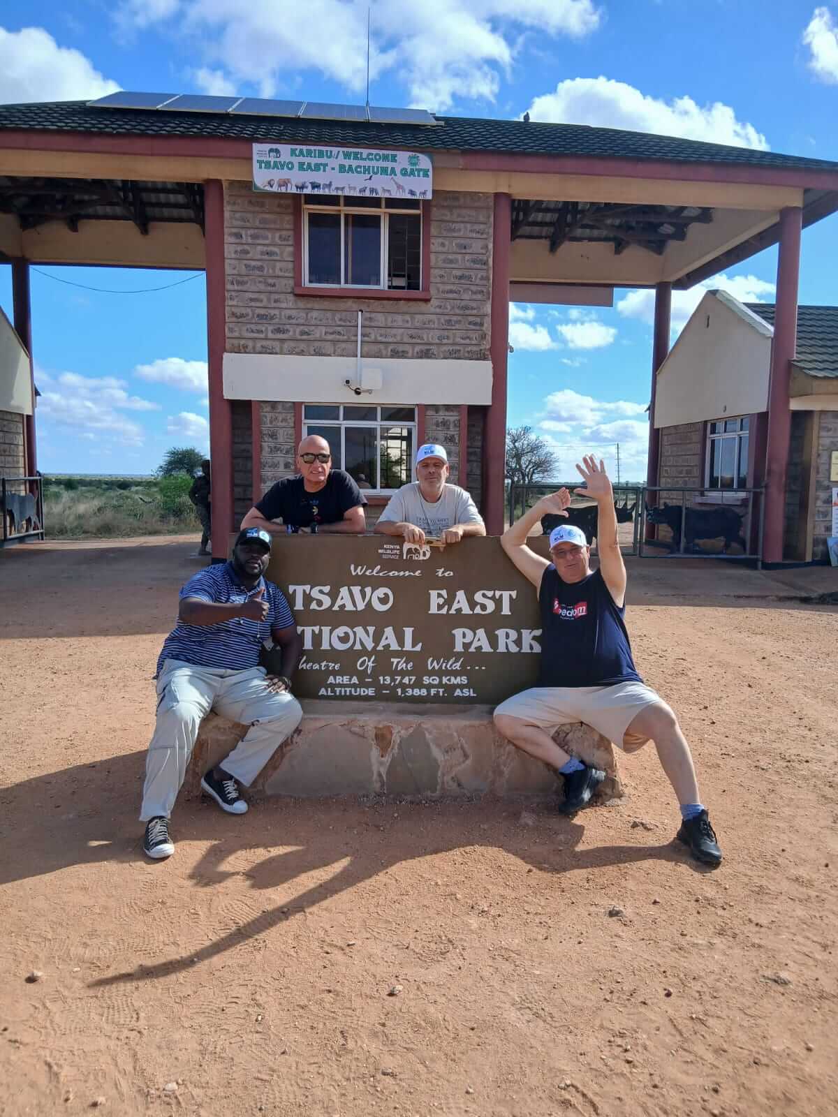 happy guests and klm kenya safaris tour guide